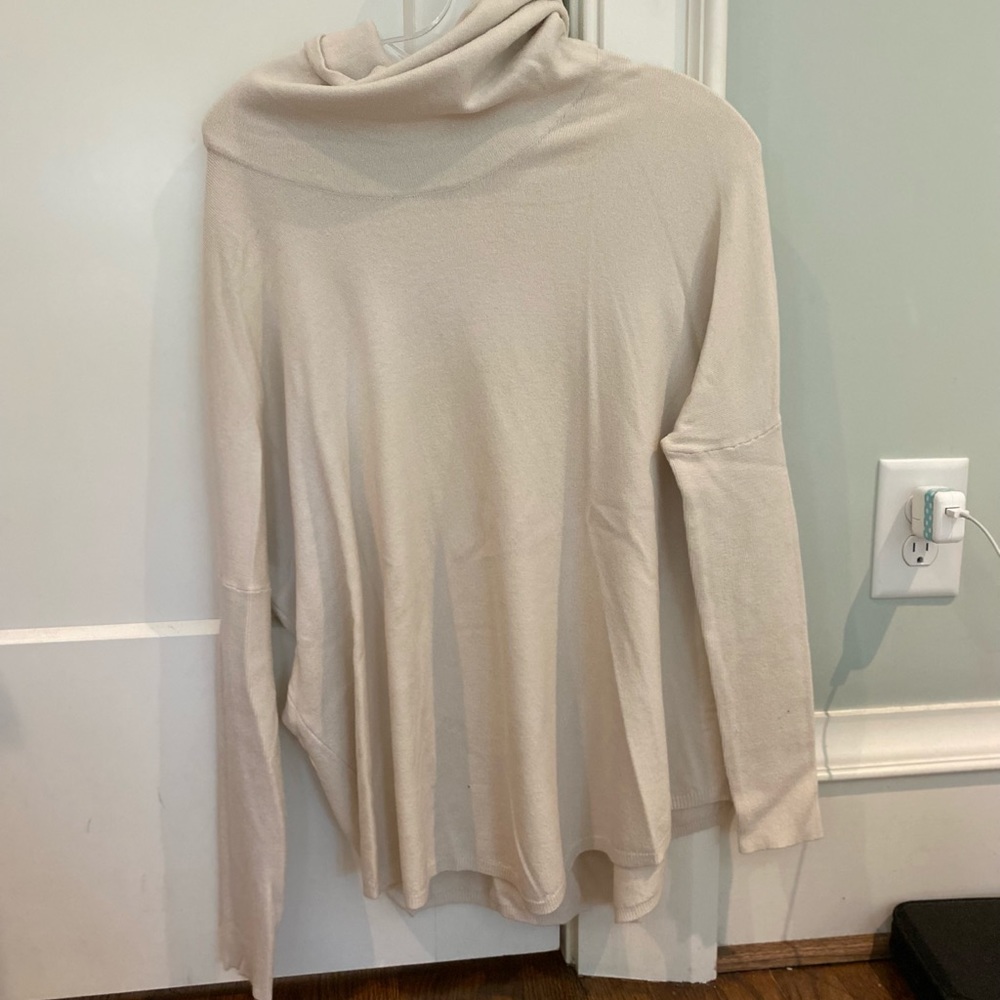 Creme turtle neck sweater